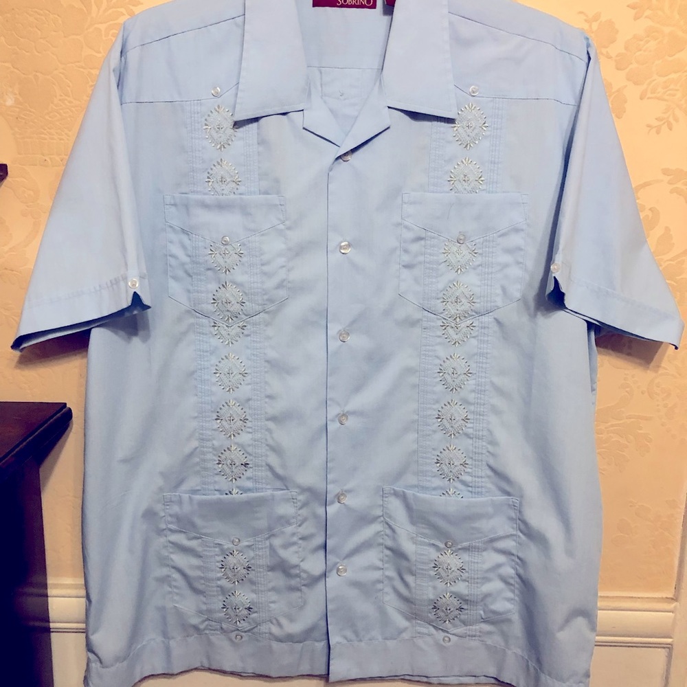 Blue man’s shirt in very good condition .Size L - cotton and polyester